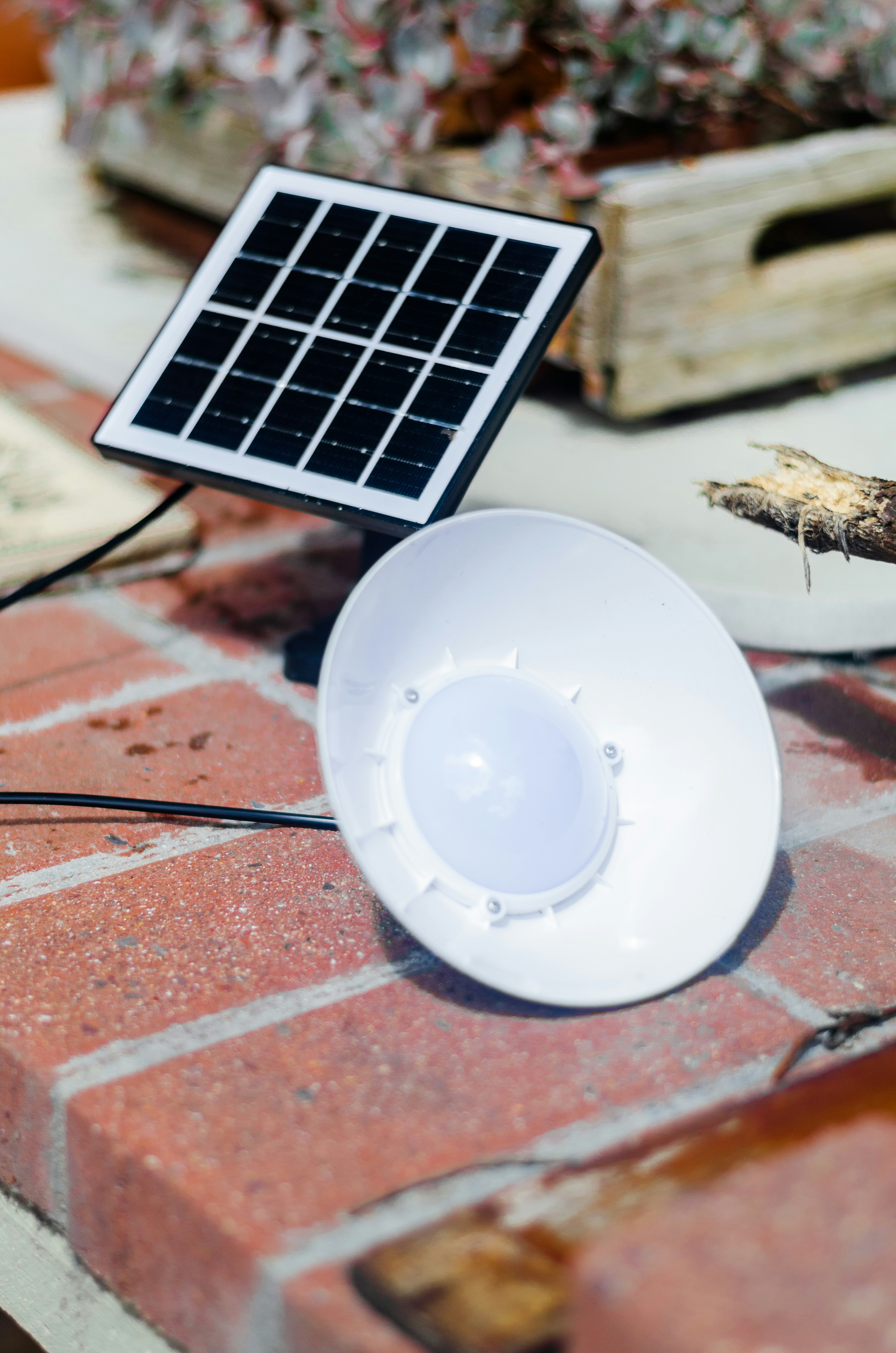 A small light connected to a small solar panel